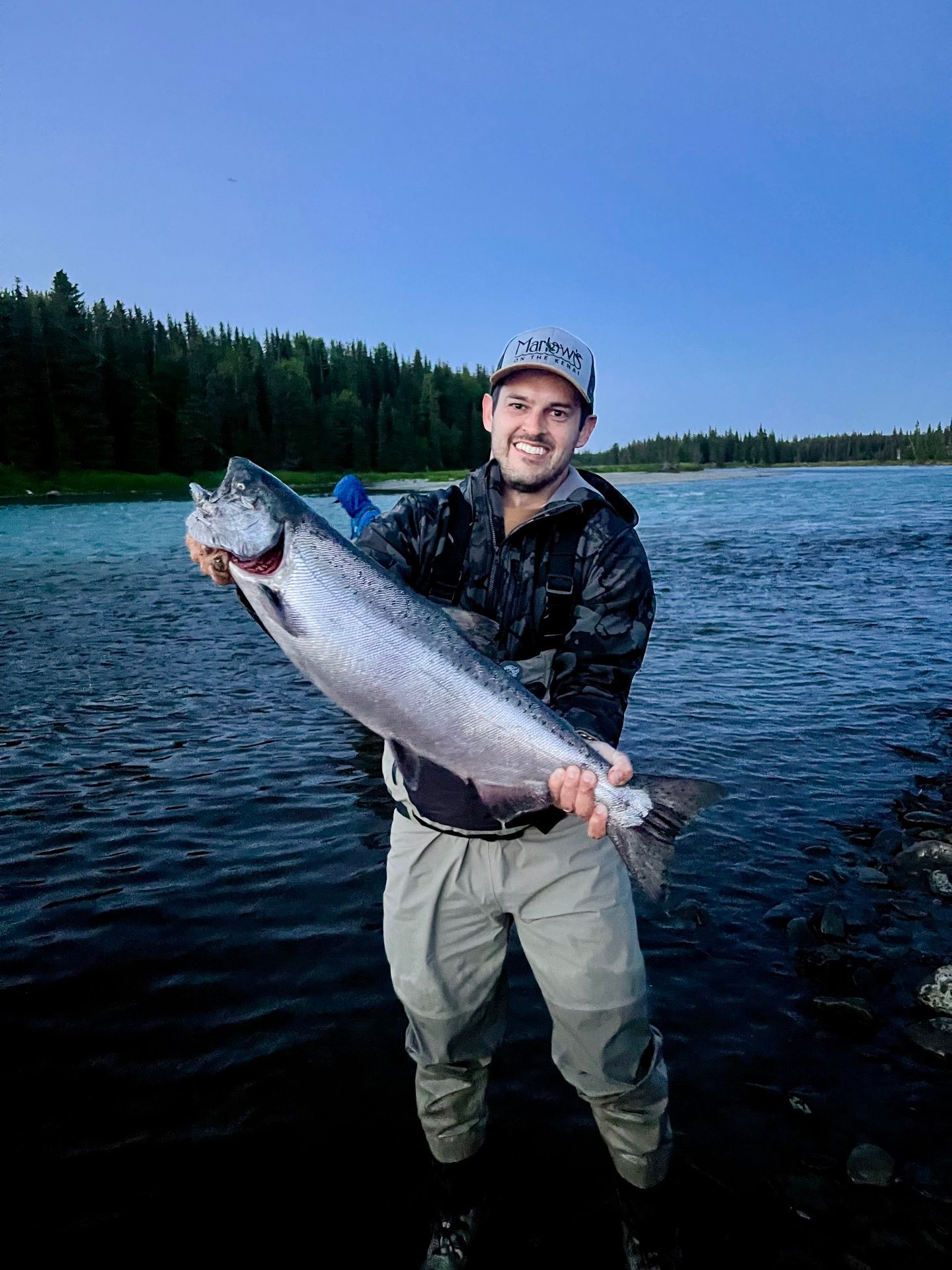 Angler in Marlow's hat with a big salmon